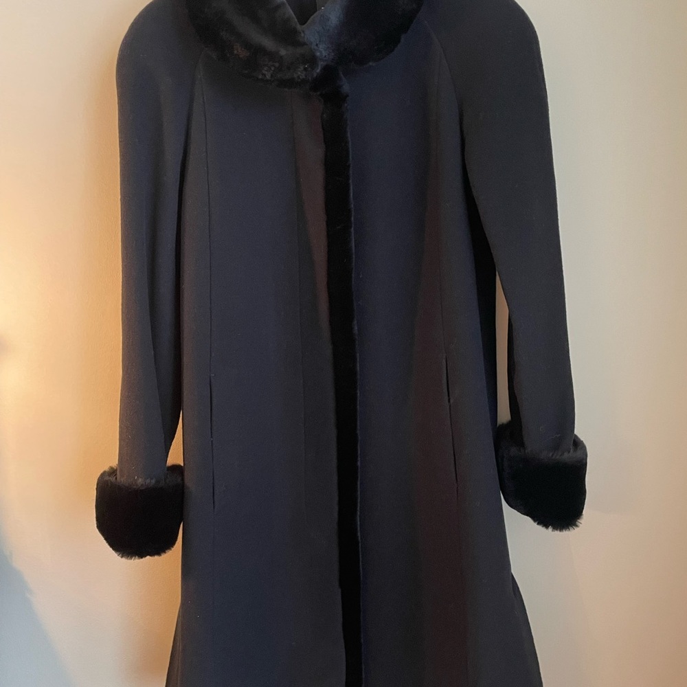 Gently used black wool blend coat with lush faux fur trim size 8-10